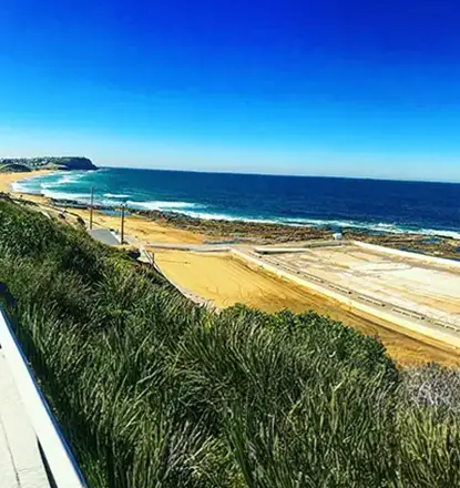Merewether Beach surf culture and the tranquil bushland of Glenrock State Conservation Area in the Hunter region.