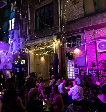 Sydney's diverse dining scene with waterfront restaurants, multicultural street food, and lively entertainment options.
